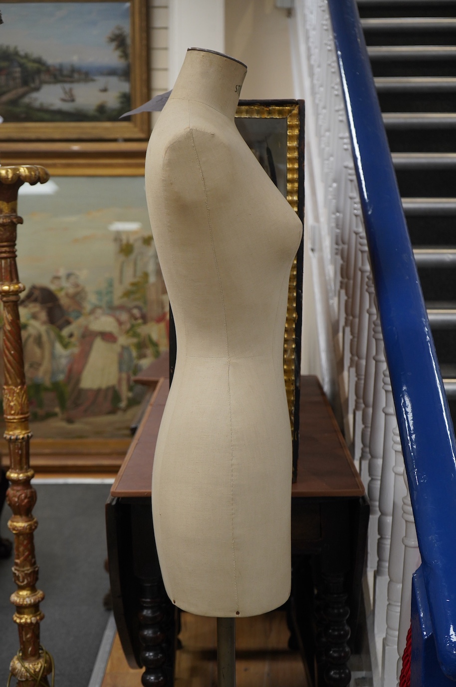 An early 20th century Stockman tailor's mannequin with cast iron stand. Condition - good